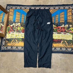 Vintage Navy nike nylon track pants Size large baggy wide leg sportswear y2k